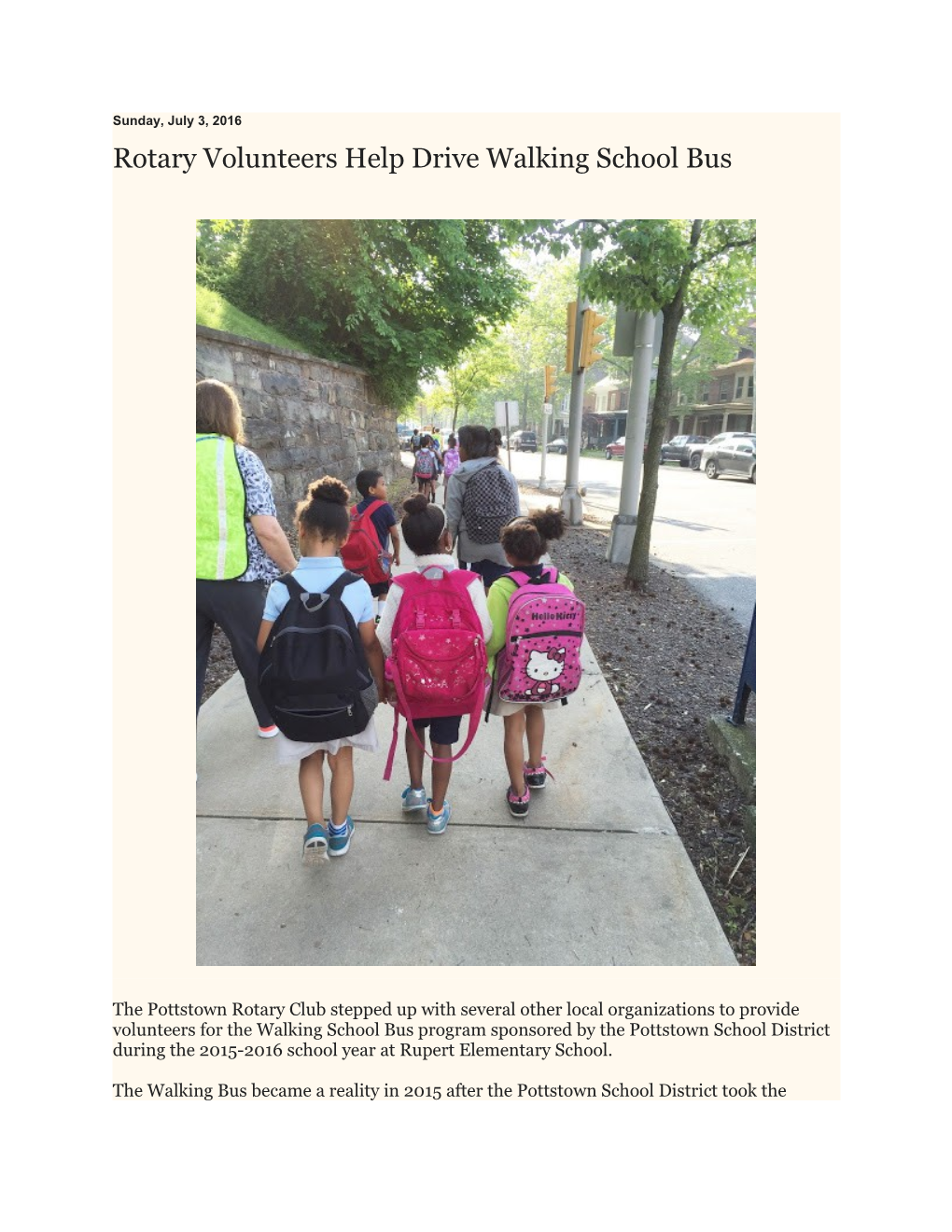 Rotary Volunteers Help Drive Walking School Bus