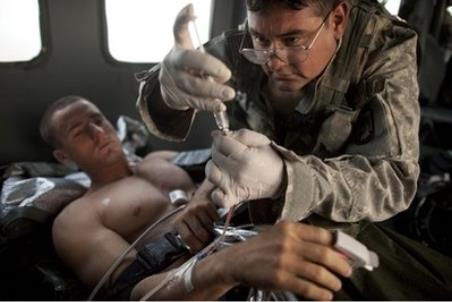 US Army flight medic SGT Jaime Adame right